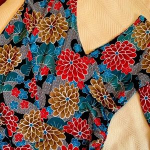 Woman’s light wrap around style dress